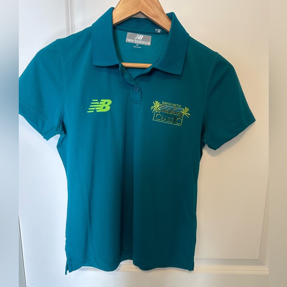 NWOT New Balance women’s XS Golf shirt. David Ortiz celebrity classic logo.